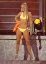 Allie is strutting her stuff in the swimsuit competition part of the Miss Teen USA pageant.